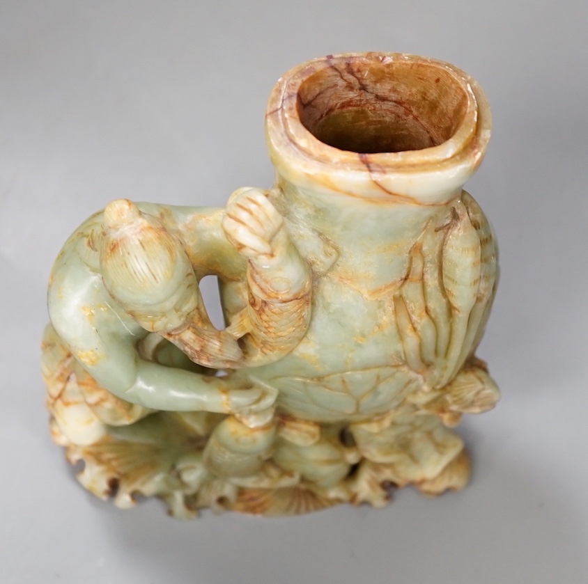 A late 19th century soapstone figural vase. 18cm